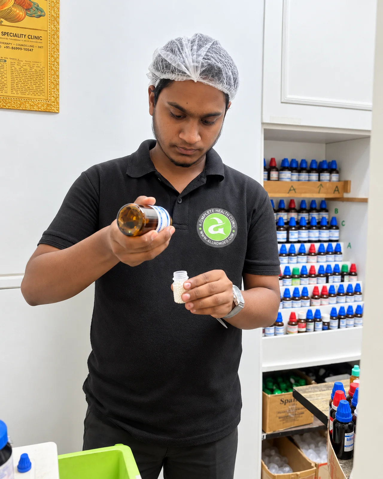 Allhomoeo staff member preparing a bottle in the dispensary